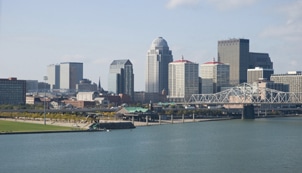 Downtown Louisville Skyline with the Ohio River in the foreground.